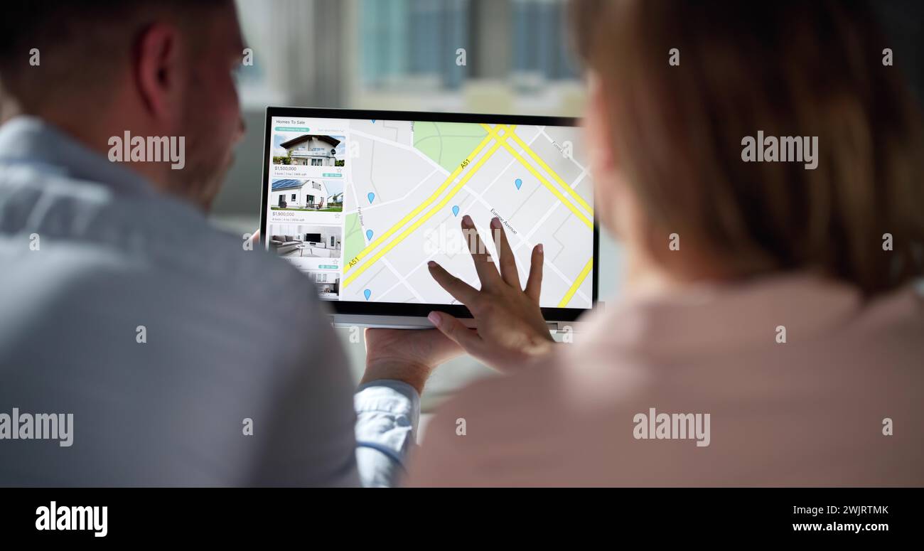 Couple Family Searching Real Estate Property Or House Online Stock Photo