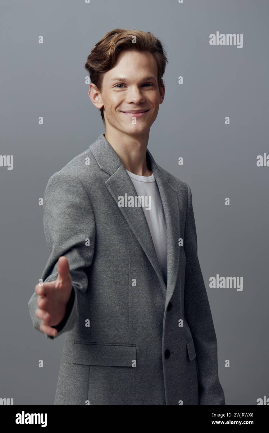 Stylish Young Man Strikes a Pose in Modern Studio Setting Stock Photo ...