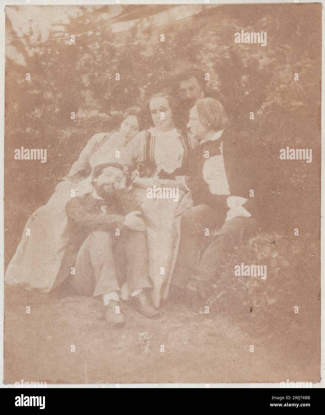 Photography representing Victor Hugo with family with his wife Adèle Foucher and his children in the garden of Hauteville between 1856 and 1860 (kept in Hauteville House), photograph of Arsène Garnier. Paris, house of Victor Hugo. 34666-10 French writer, child, wife, woman, Hauteville house, garden, family portrait Stock Photo