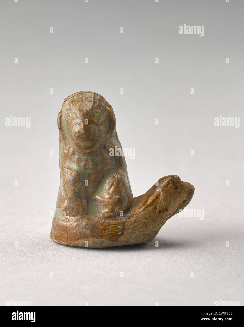 Statuette (usual name), 1400. Covered sandstone. Cernuschi Museum, Asia