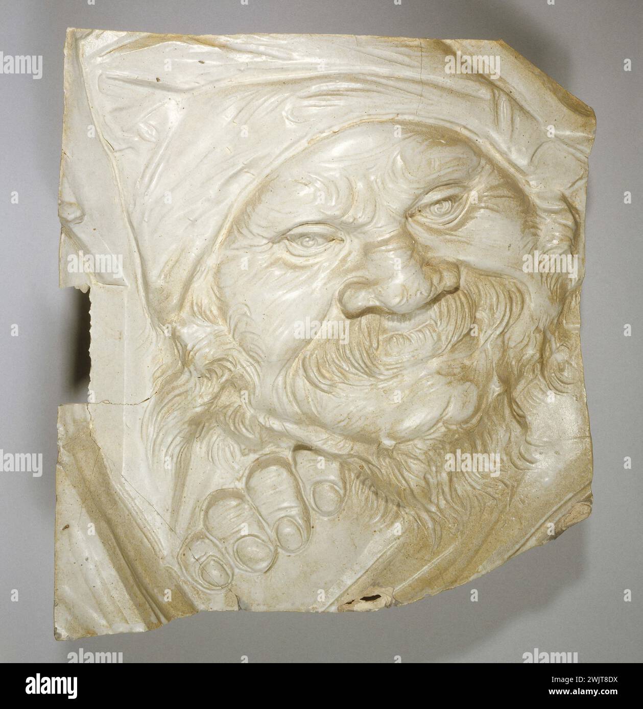 Jean Carriès (1855-1894). 'Floor, wall covering: grotesque mask in enameled sandstone (bearded old man)'. Museum of Fine Arts of the City of Paris, Petit Palais. 24190-15 Beard, ceramic, gres emaille, grotesque, man, mask, portrait, reverse, soil, bearded old man, face, wall Stock Photo