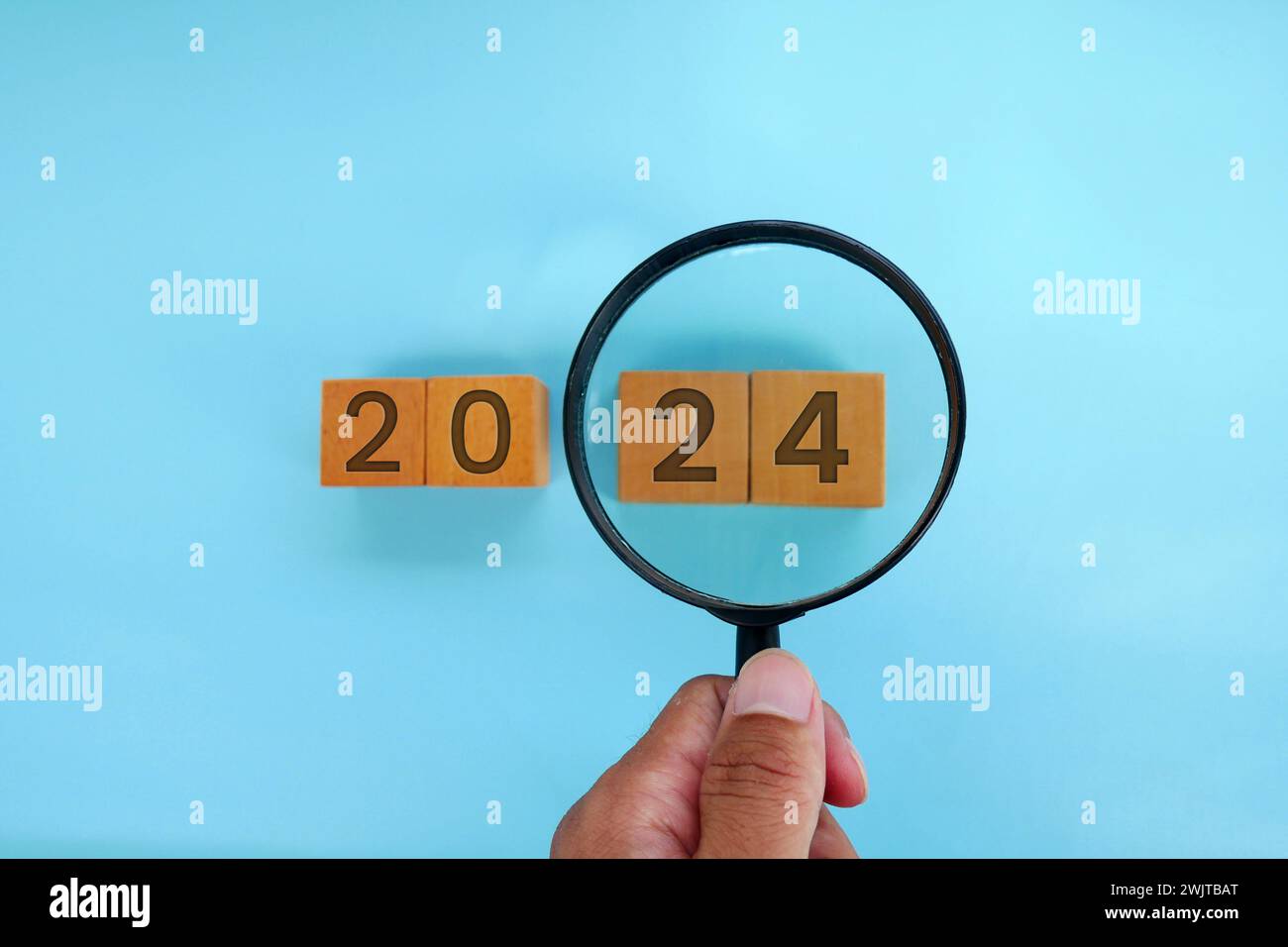 Magnifying glass and targets 2025. Concept of new year 2025, beginning of success, challenge or