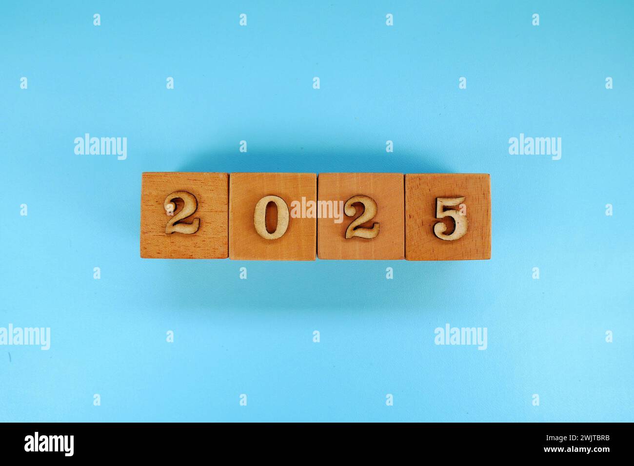 Wooden block with text 2025. Concept of new year 2025, beginning of