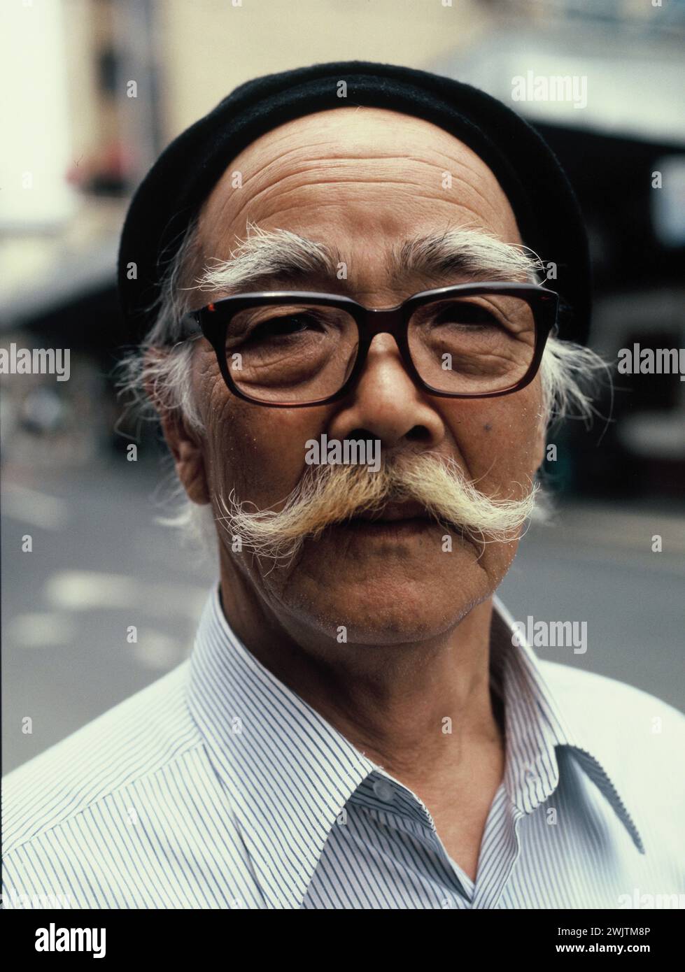 Japan. Nagasaki. Outdoor portrait of local old man. Stock Photo