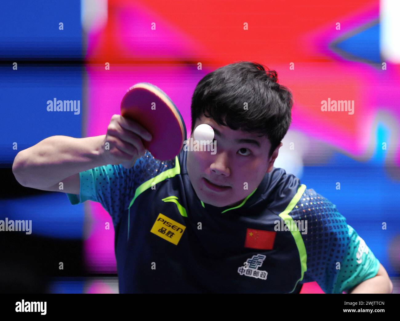 Busan, South Korea. 17th Feb, 2024. Liang Jingkun of China serves to Jorge Campos of Cuba during the men's team Group 1 match between China and Cuba at the ITTF World Team Table Tennis Championships Finals Busan 2024 in Busan, South Korea, Feb. 17, 2024. Credit: Yang Shiyao/Xinhua/Alamy Live News Stock Photo