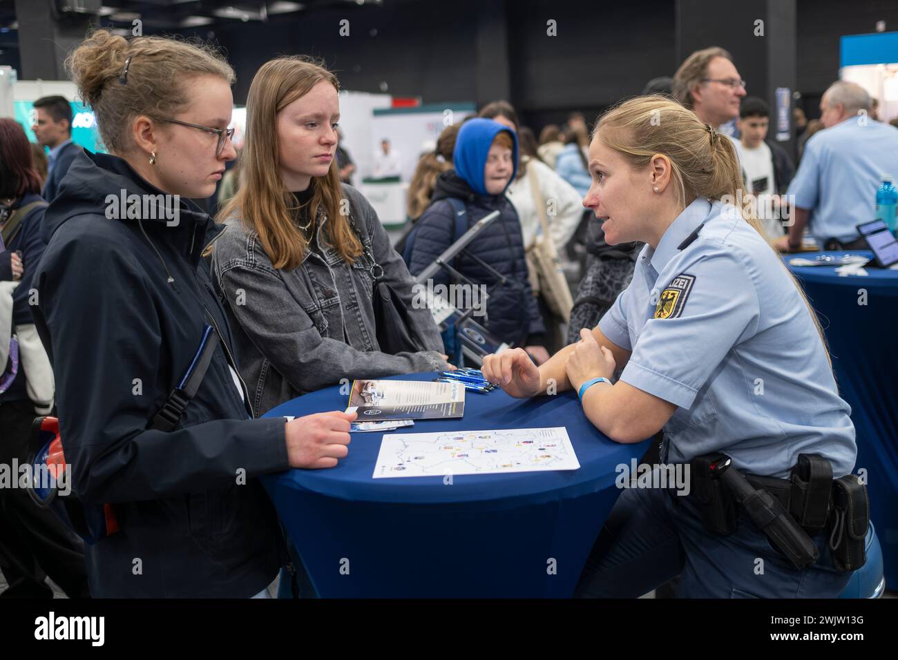 Career orientation fair EINSTIEG.. Police stand. The police are urgently looking for new recruits. Stock Photo