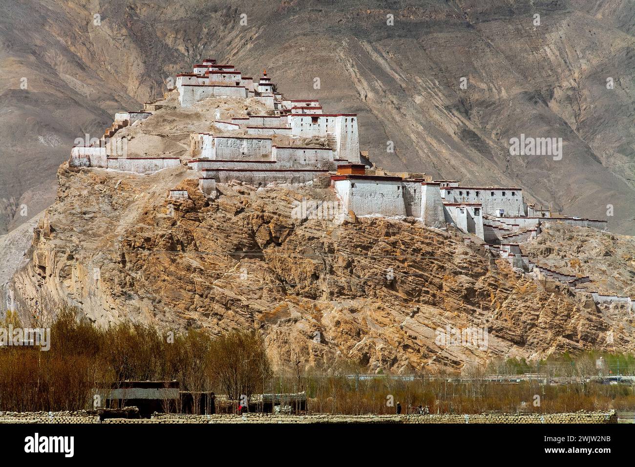 Gyantse Fortress or Gyantse Dzong is one of the best preserved dzongs in Tibet, located high above the historic  town of Gyantse on a huge spur of gre Stock Photo