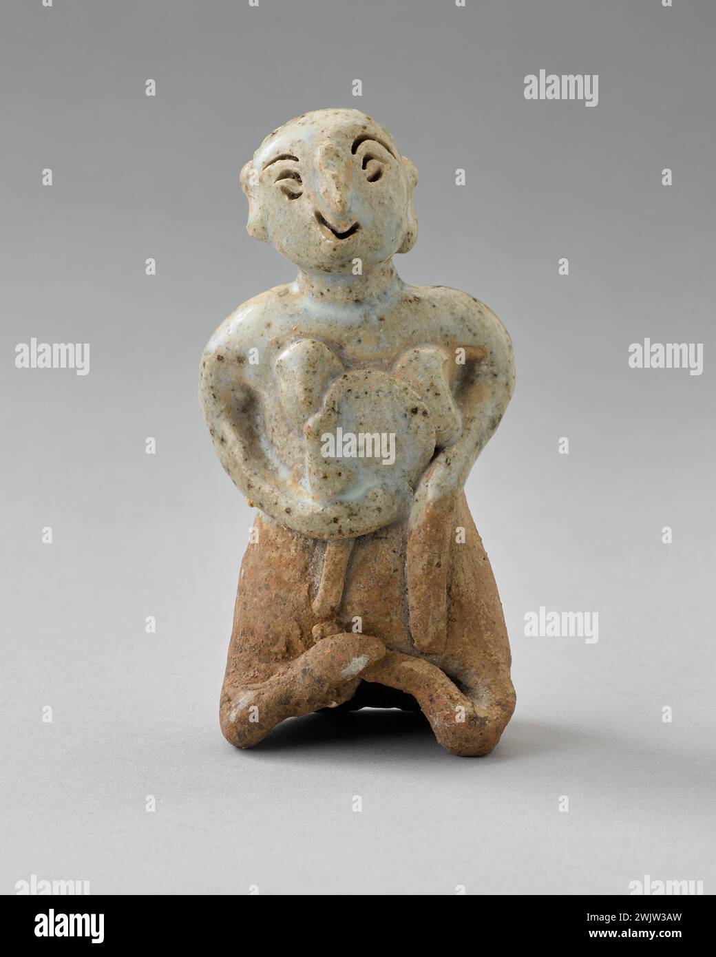 Statuette (usual name), 1400. Covered sandstone. Cernuschi Museum, Asia
