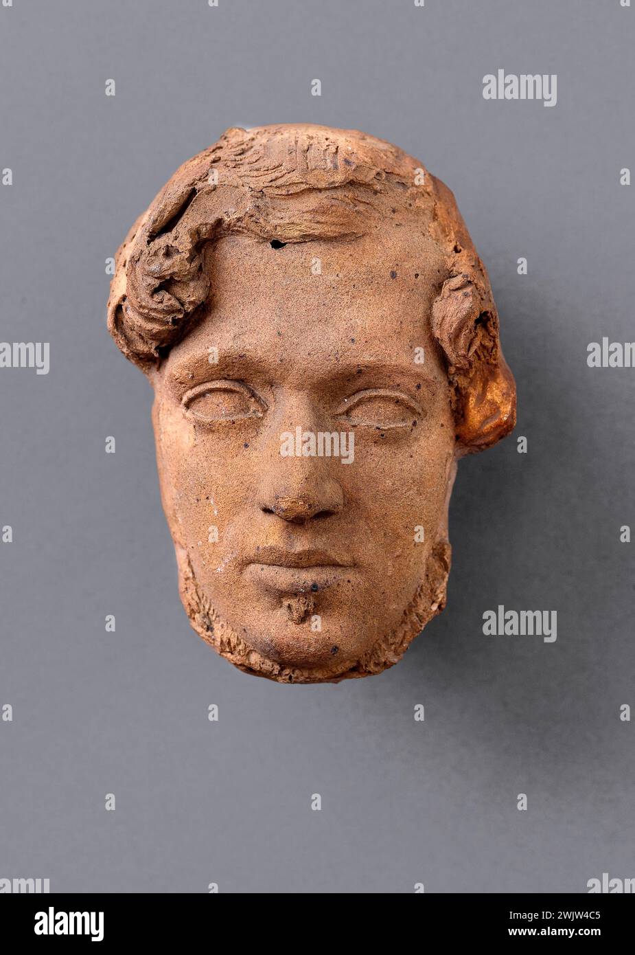 Jean-Pierre Dantan (1800-1869), said Dantan the young. Unknown mask. Terracotta and plaster. Paris, Carnavalet museum. Mask, plaster, terracotta Stock Photo