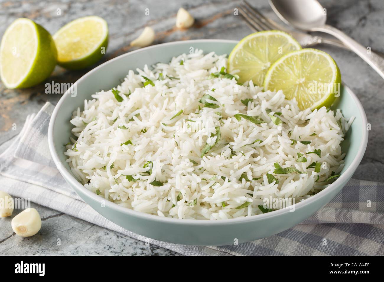 Horizontal Rice Pictures Organic cilantro lime rice with garlic and zest close-up in a bowl on ...