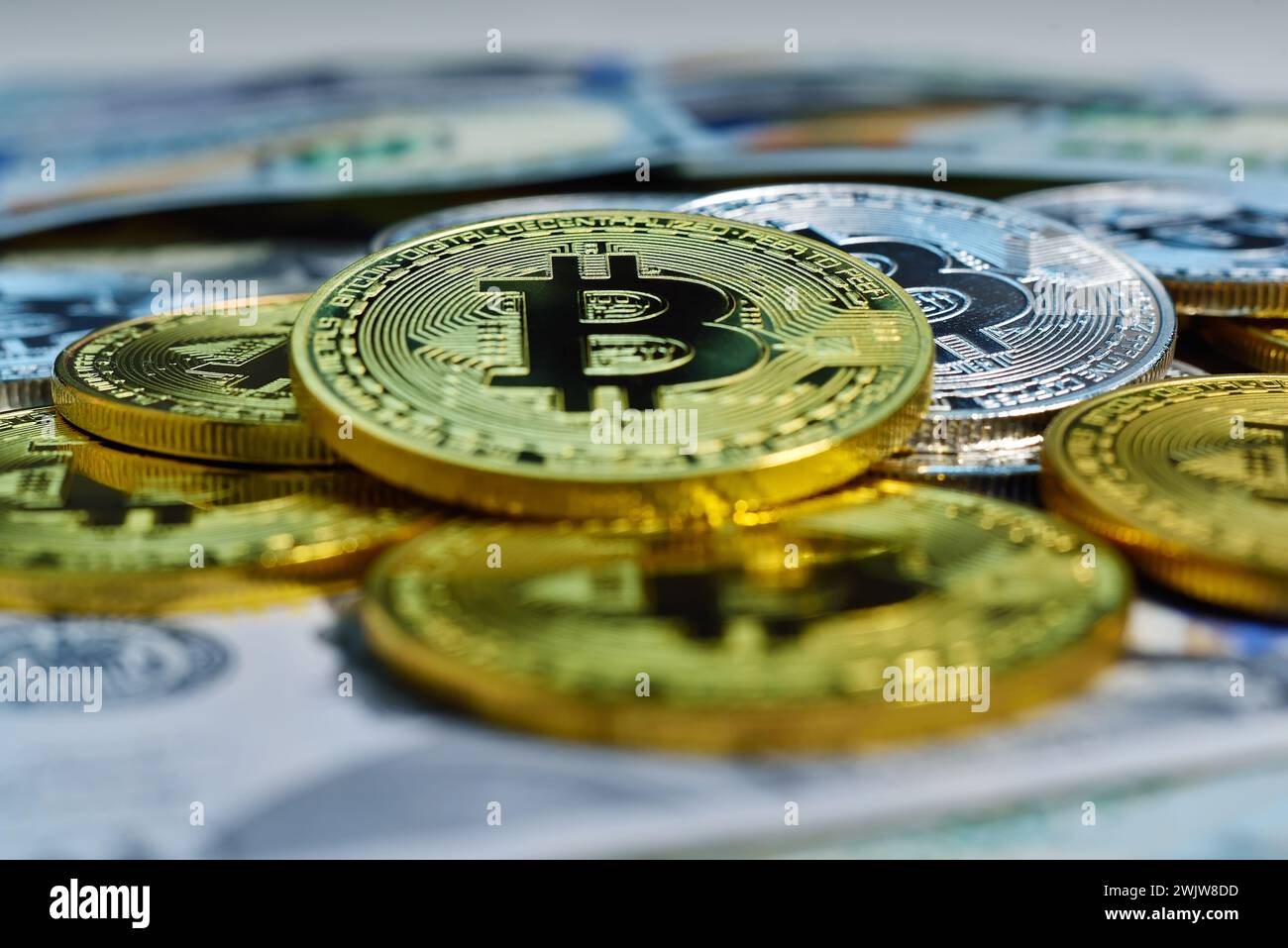 Golden bitcoin cryptocurrency on pile gold coins a lot of Stock Photo -  Alamy