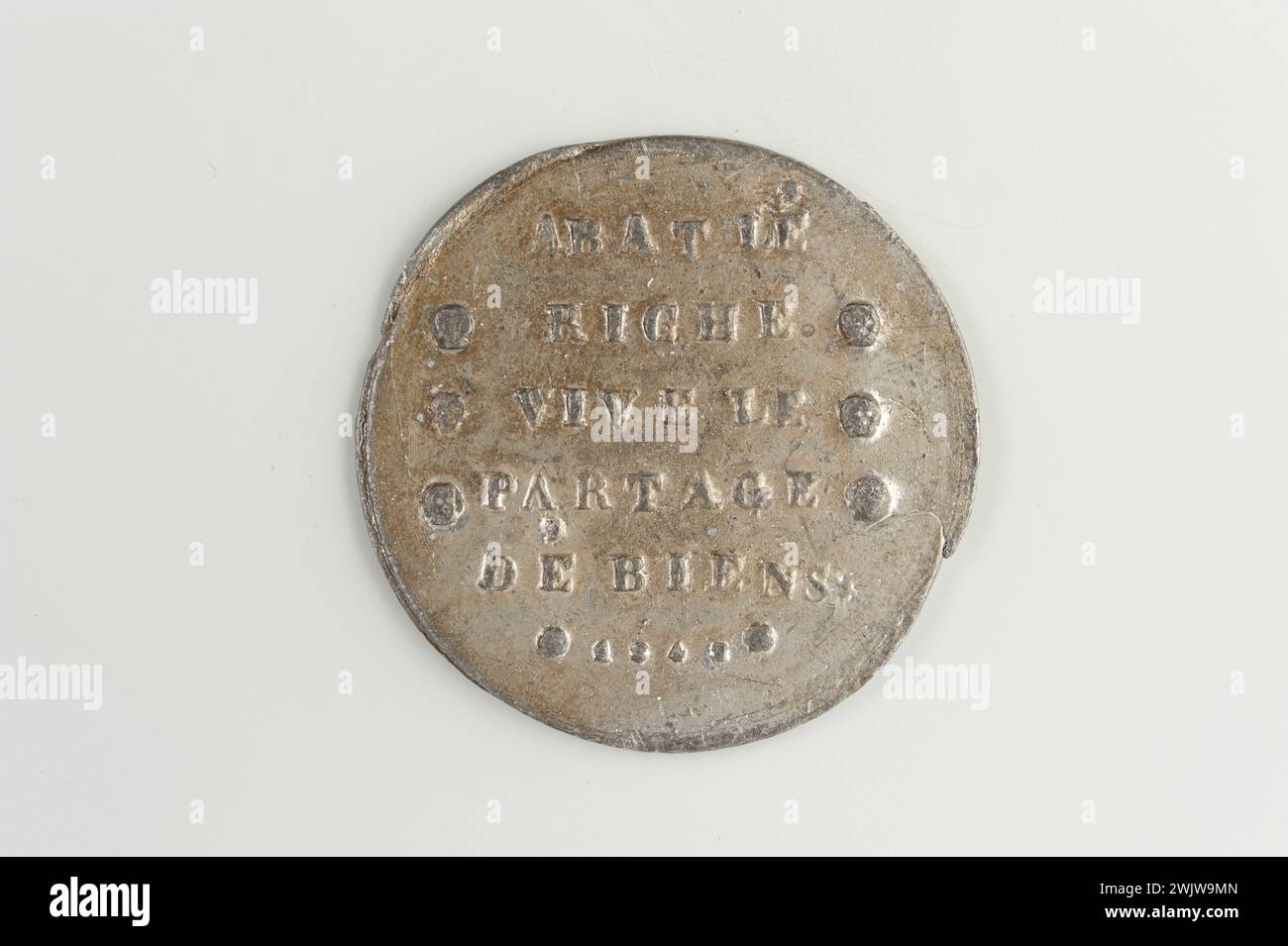 Carnavalet museum, medal collection Right registration on six lines, scored on both sides of skulls; Reverse inscription on four lines above three dead heads in staggered care surrounding the Lille inscription. Stock Photo