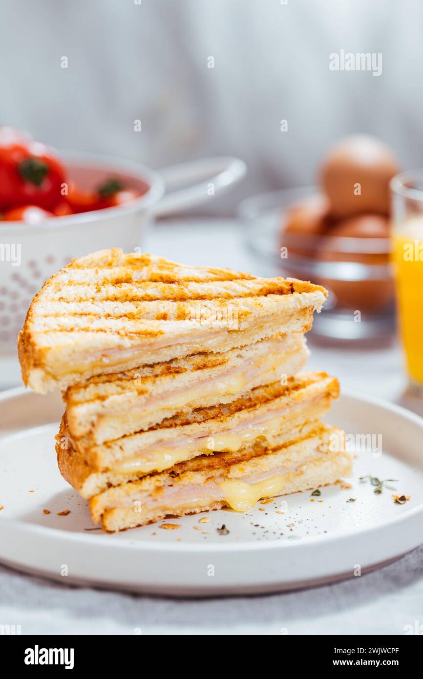 Sliced Cut Toast sandwich with molten Gouda cheese turkey ham on a ...