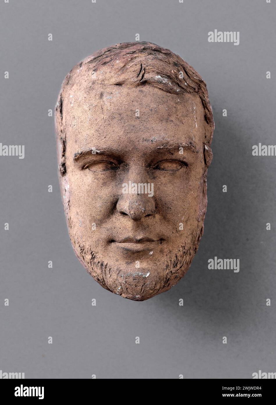 Jean-Pierre Dantan (1800-1869), said Dantan the young. Unknown mask. Terracotta and plaster. Paris, Carnavalet museum. Mask, plaster, terracotta Stock Photo