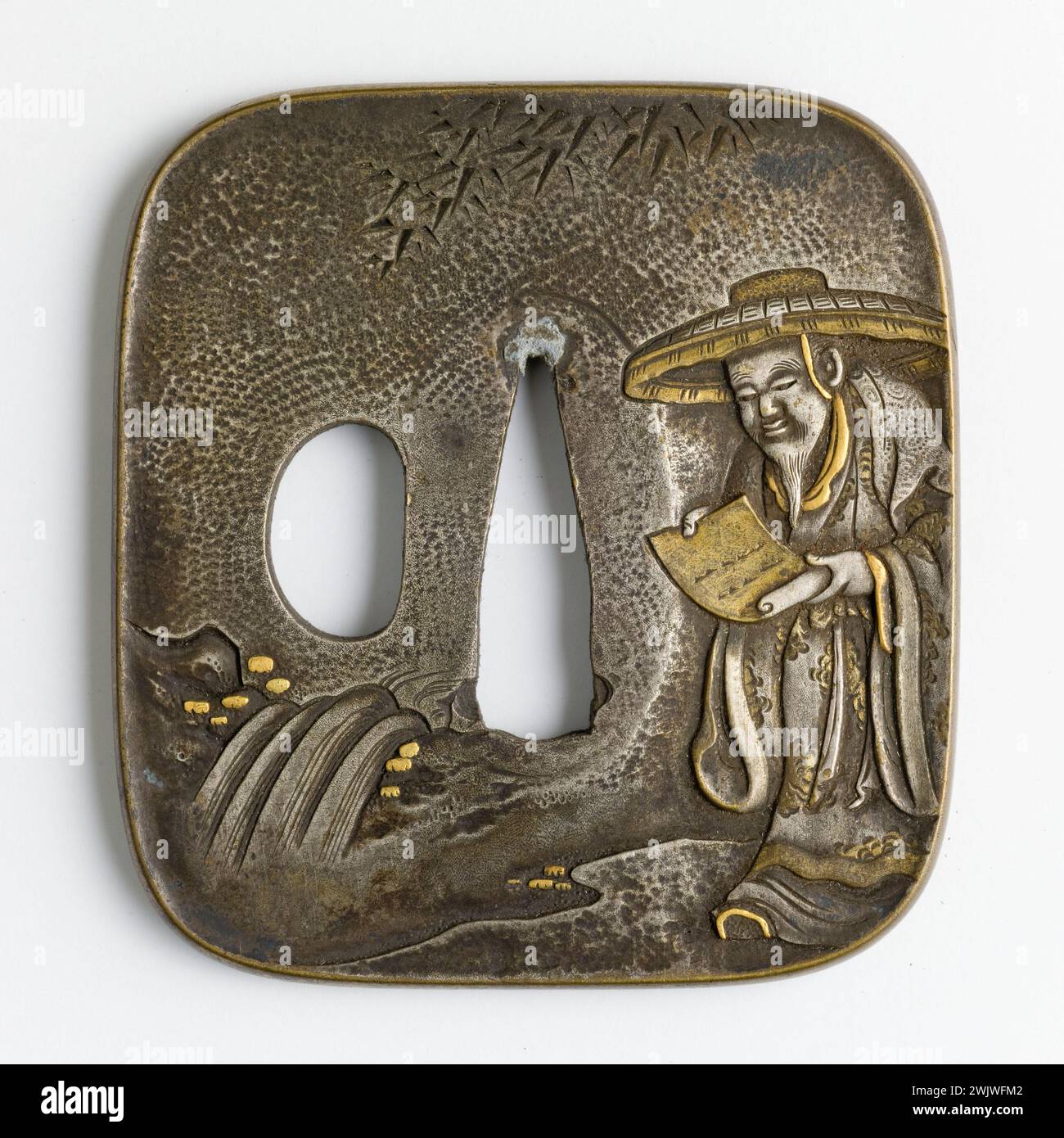 Tsuba. Camp Muneshige, Japan. Ringin inlaid with gold, 18th century