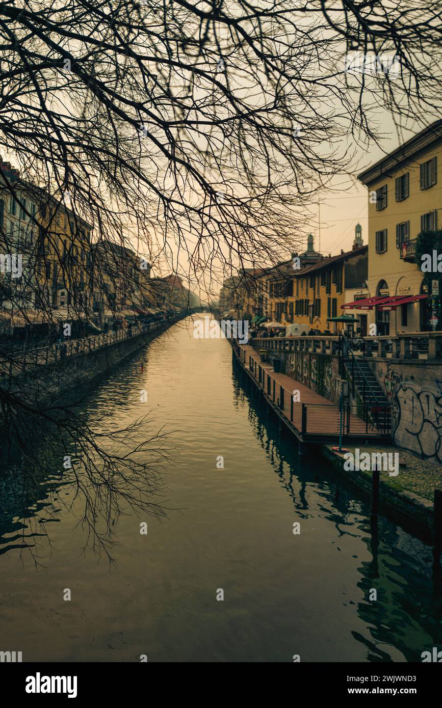 Embrace the charm of Milan's historic heart at Darsena: where tranquil waters meet vibrant culture. An afternoon to savor, a memory to cherish Stock Photo