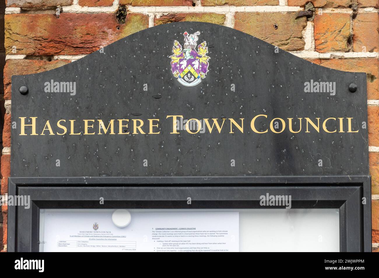 Haslemere Town Council notice board or sign on the Town Hall building in the centre of Haslemere, Surrey, England, UK Stock Photo