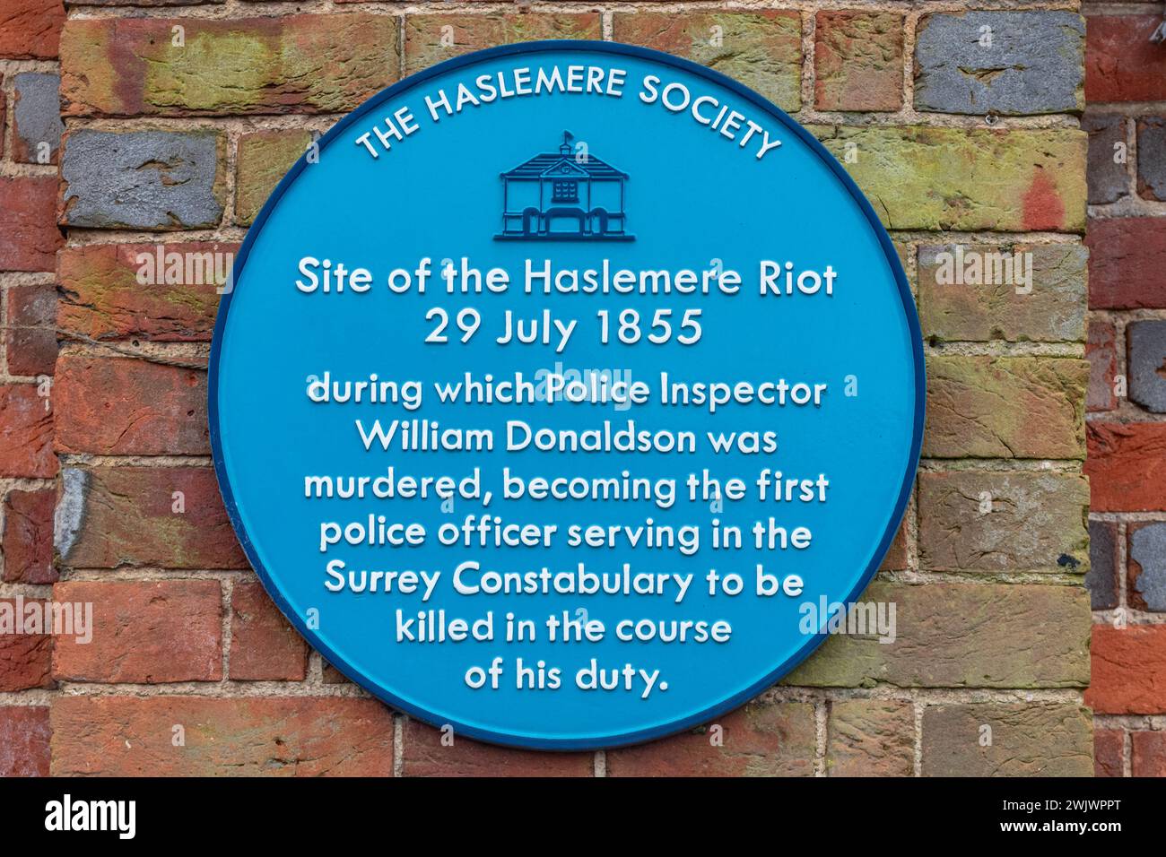 The Haslemere Society Blue Plaque showing the site of the 1855 Haslemere Riot on the town hall, Surrey, England, UK Stock Photo