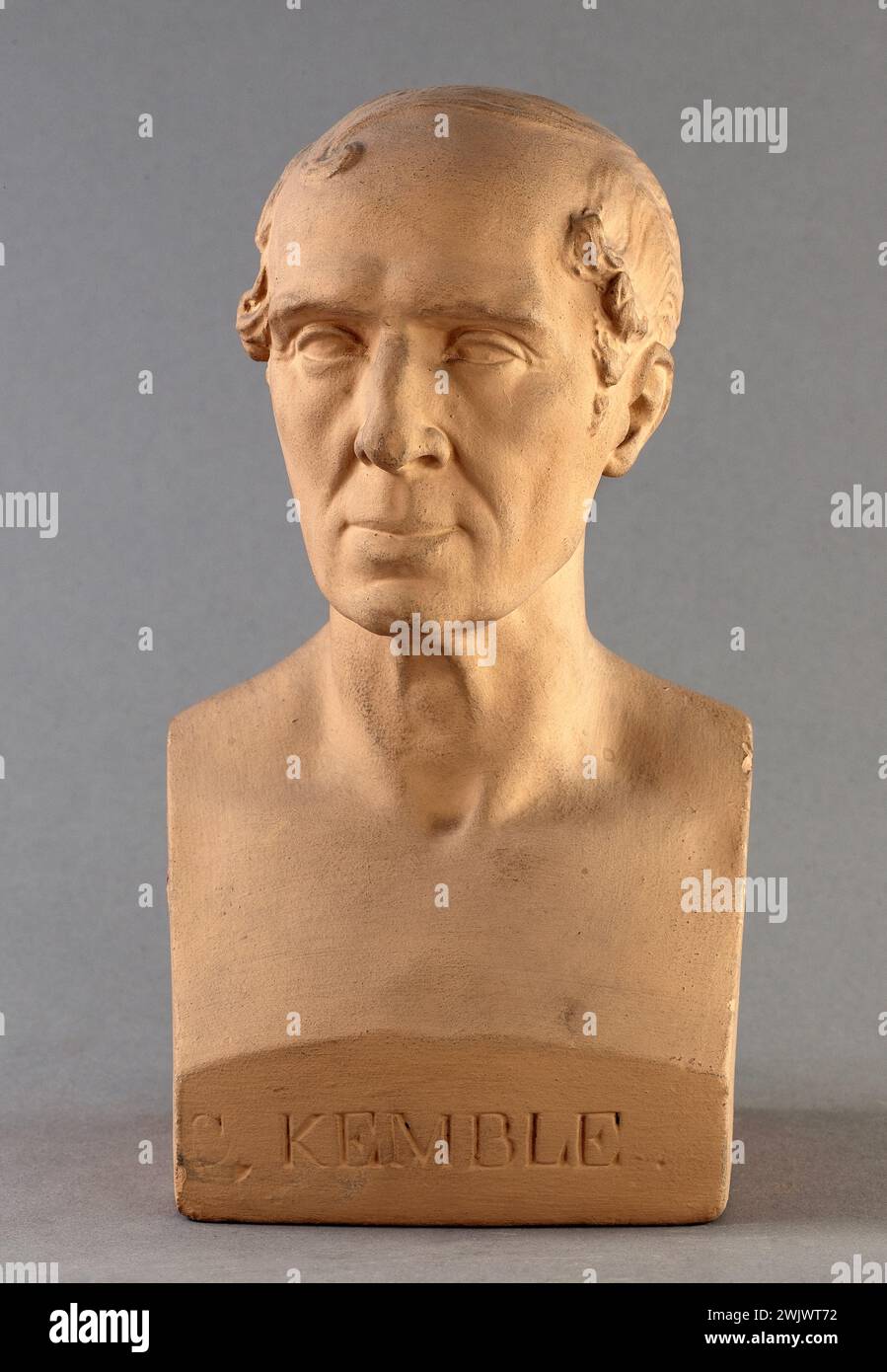 Jean-Pierre Dantan (1800-1869), said Dantan the young. Serious portrait of the English actor, Charles Kemble (1775-1854). Terracotta patinated plaster, round-bump. 1842. Paris, Carnavalet museum. English actor, bust, patterned patina, man portrait, terracotta Stock Photo
