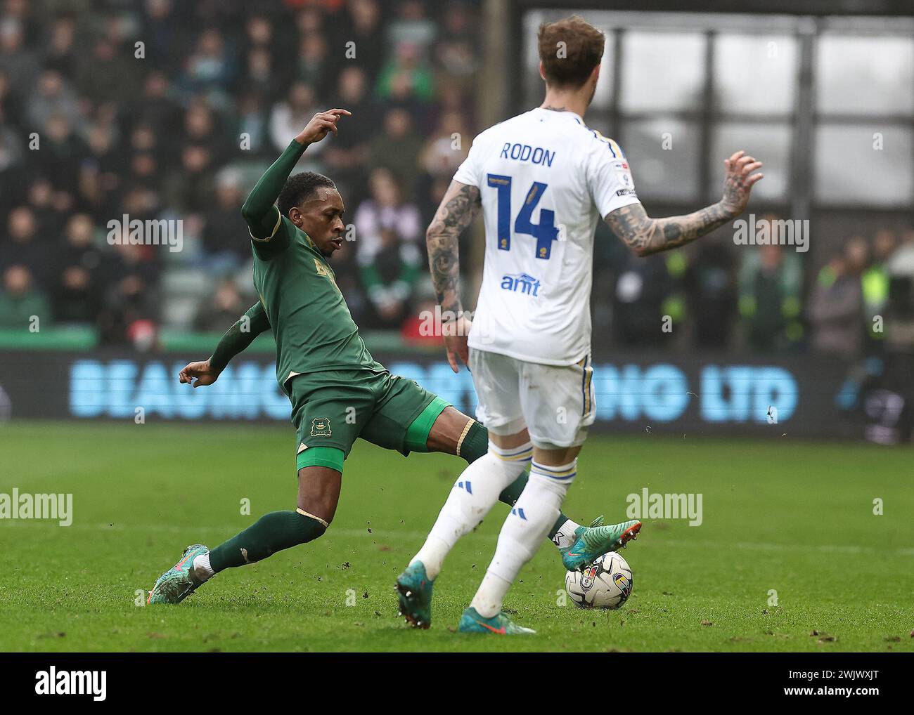 Mickel Miller of Plymouth Argyle defending  during the Sky Bet Championship match Plymouth Argyle vs Leeds United at Home Park, Plymouth, United Kingdom, 17th February 2024  (Photo by Stan Kasala/News Images) Stock Photo
