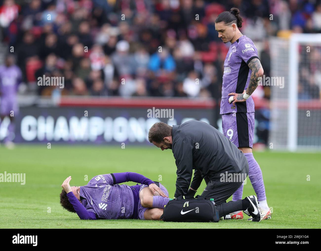 London, UK. 17th Feb, 2024. Curtis Jones of Liverpool receives medical