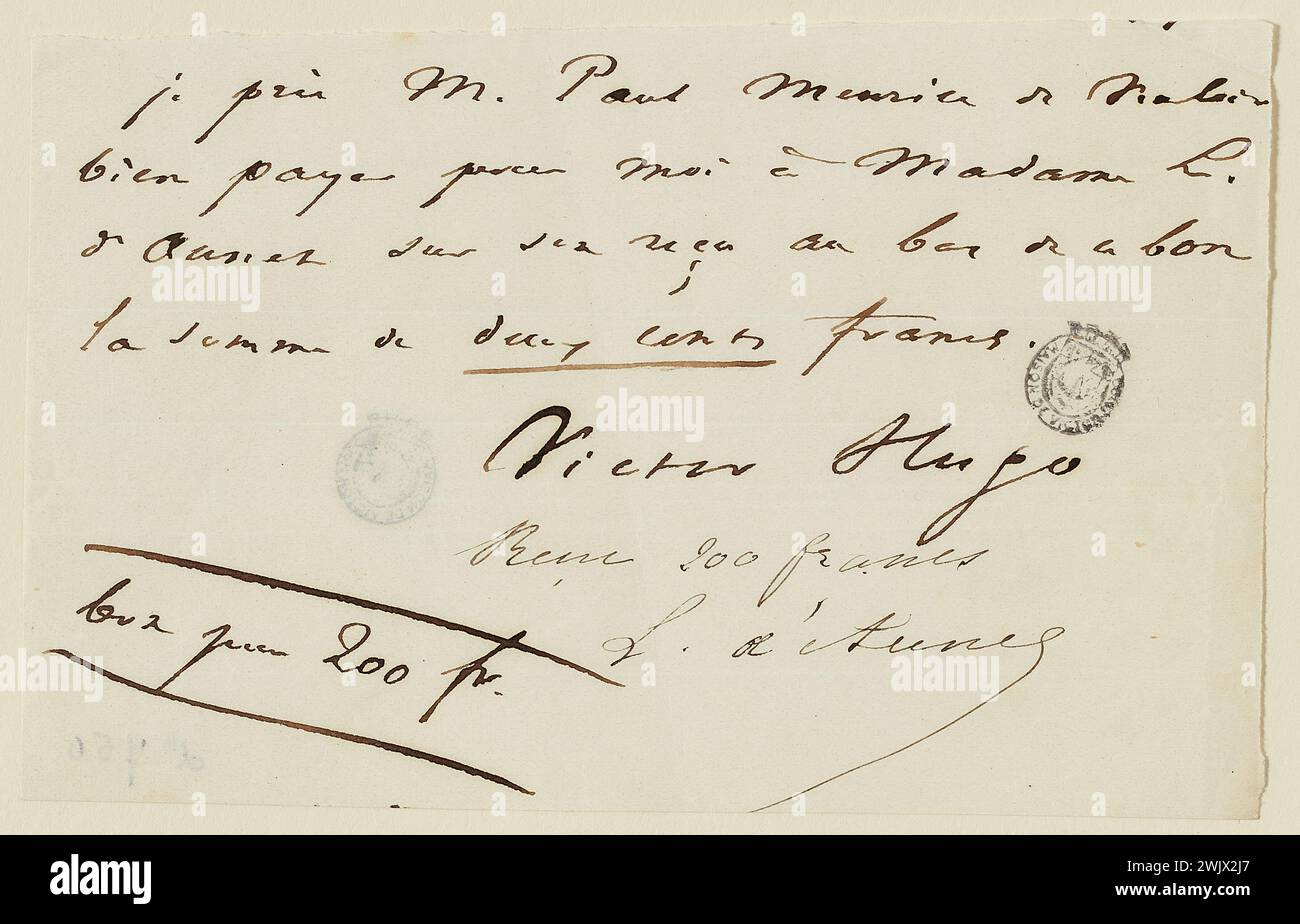 Hugo, Victor (N.1802-02-26-D.1885-05-22), Victor Hugo ticket to Paul Meurice for the payment of 200 F. to Léonie d'Aunet (dummy title). Ink on paper. Houses of Victor Hugo Paris - Guernsey. Stock Photo