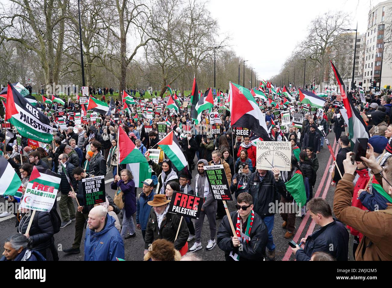 People take part in a pro-Palestine march in central London, organised