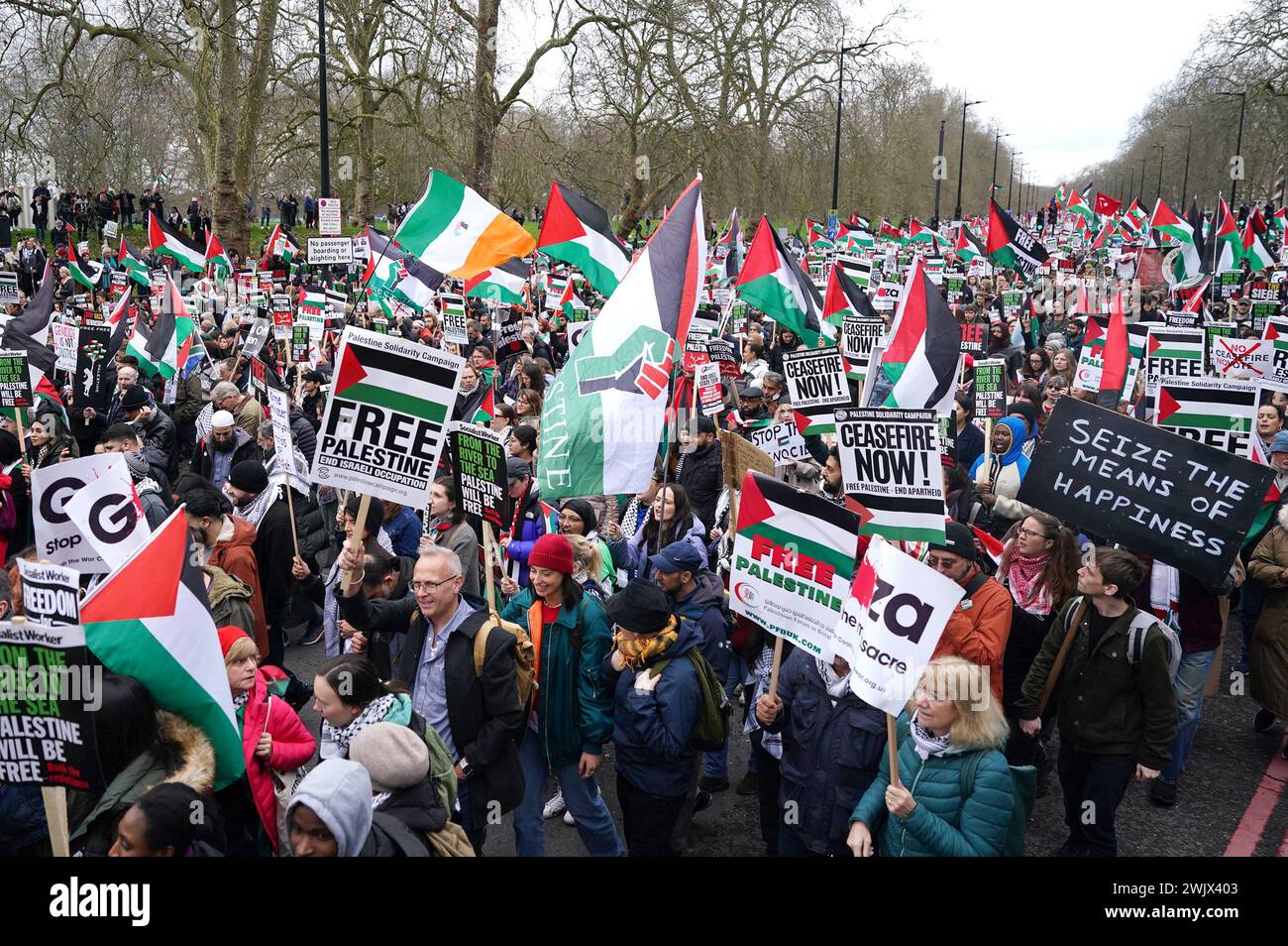 People take part in a pro-Palestine march in central London, organised