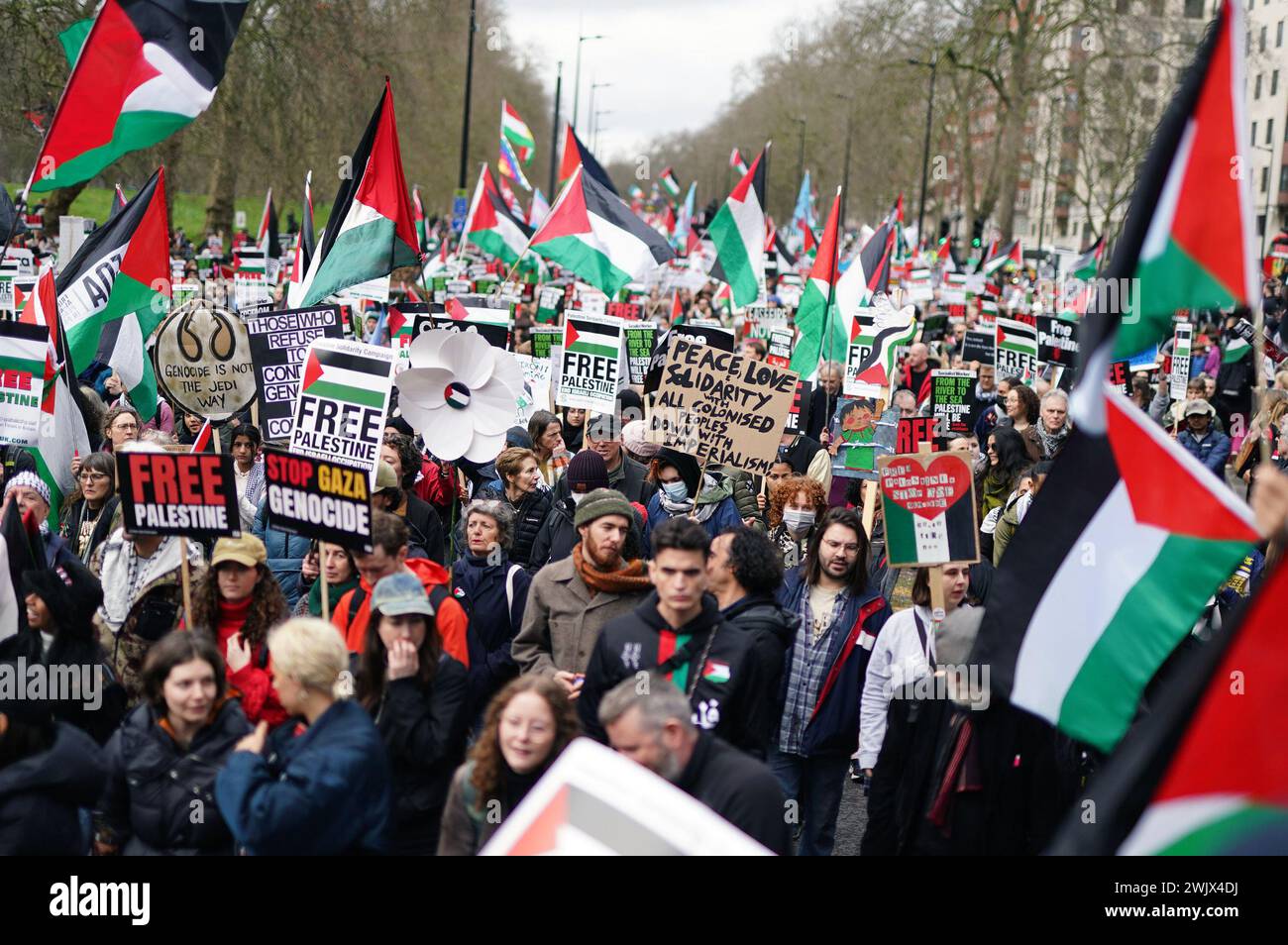 People take part in a pro-Palestine march in central London, organised
