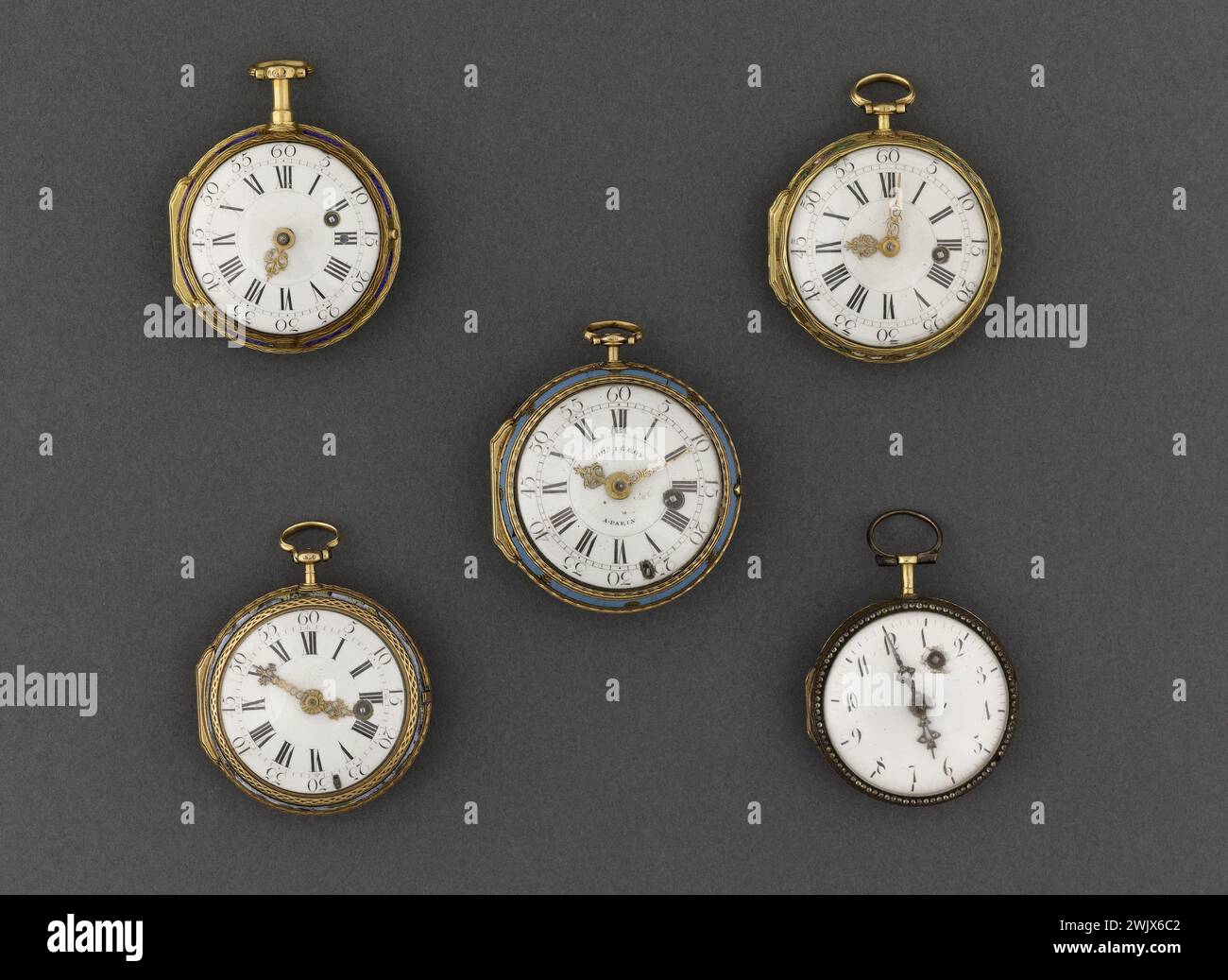 Various clocks. Watches. Enamelled gold. 18th century. Paris, Cognacq