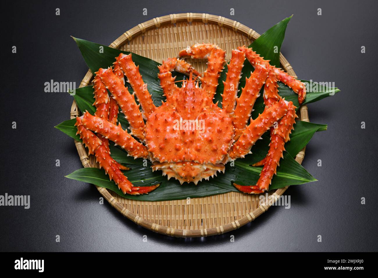 boiled red king crab on a bamboo tray Stock Photo