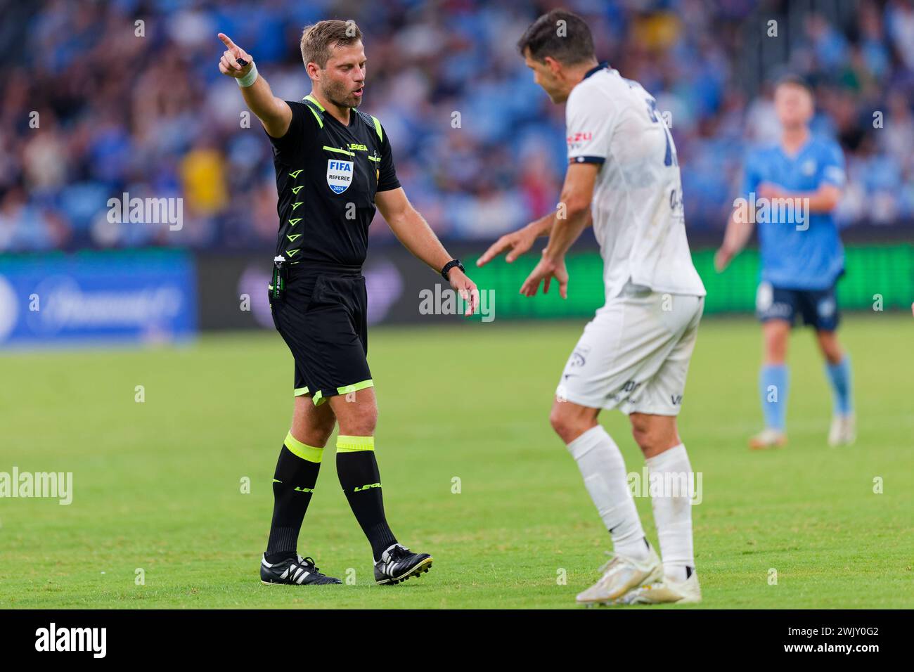 Sydney, Australia. 17th Feb, 2024. Match referee, Alex King speaks to Javier López of Adelaide United during the A-League Men Rd17 match between Sydney FC and Adelaide United at Alliance Stadium on Feb 17, 2024 in Sydney, Australia Credit: IOIO IMAGES/Alamy Live News Stock Photo