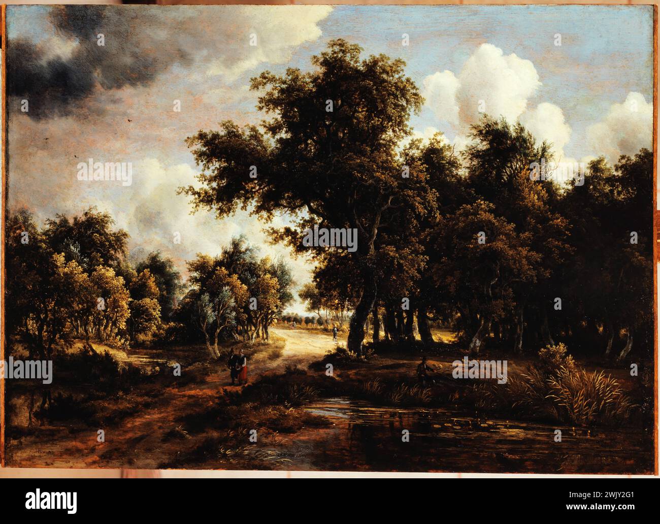 Meitert Hobbema (1638-1709). 'The path in the forest'. Oil on wood. 1658. Museum of Fine Arts of the City of Paris, Petit Palais. 74388-25 Pond, water extent, forest, wood on wood, walking, walker, cloud, landscape, person, wood, path, couple, walk Stock Photo