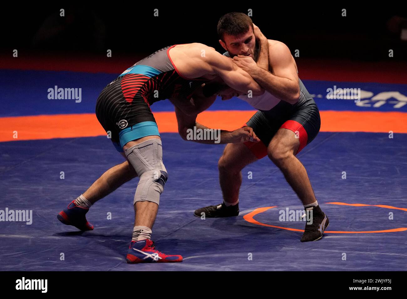 Albania's Islam Dudaev, left, competes with Individual Neutral Athlete