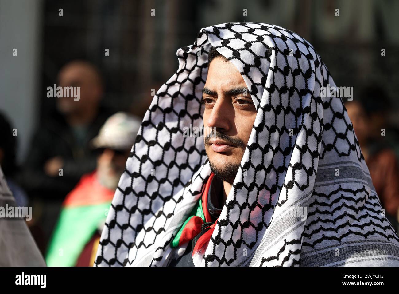 Paris, France. 17th Feb, 2024. A demonstrator with a keffiyeh. Demonstration in support of the Palestinian people to demand a ceasefire, an end to military operations against the Gaza Strip, an end to the Israeli-Palestinian conflict and recognition of the rights of the Palestinian people, at the Fountain of the Innocents, on February 17, 2024 in Paris, France. Photo by Christophe Michel/ABACAPRESS.COM Credit: Abaca Press/Alamy Live News Stock Photo