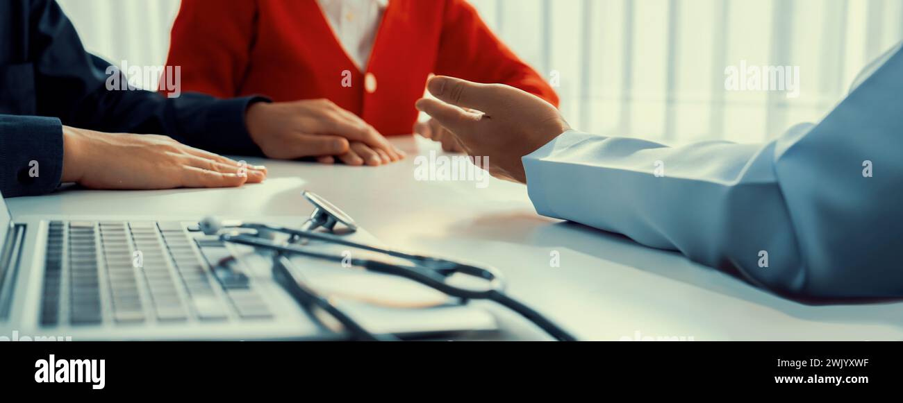 Couple attend fertility or medical consultation with gynecologist at hospital as family planning