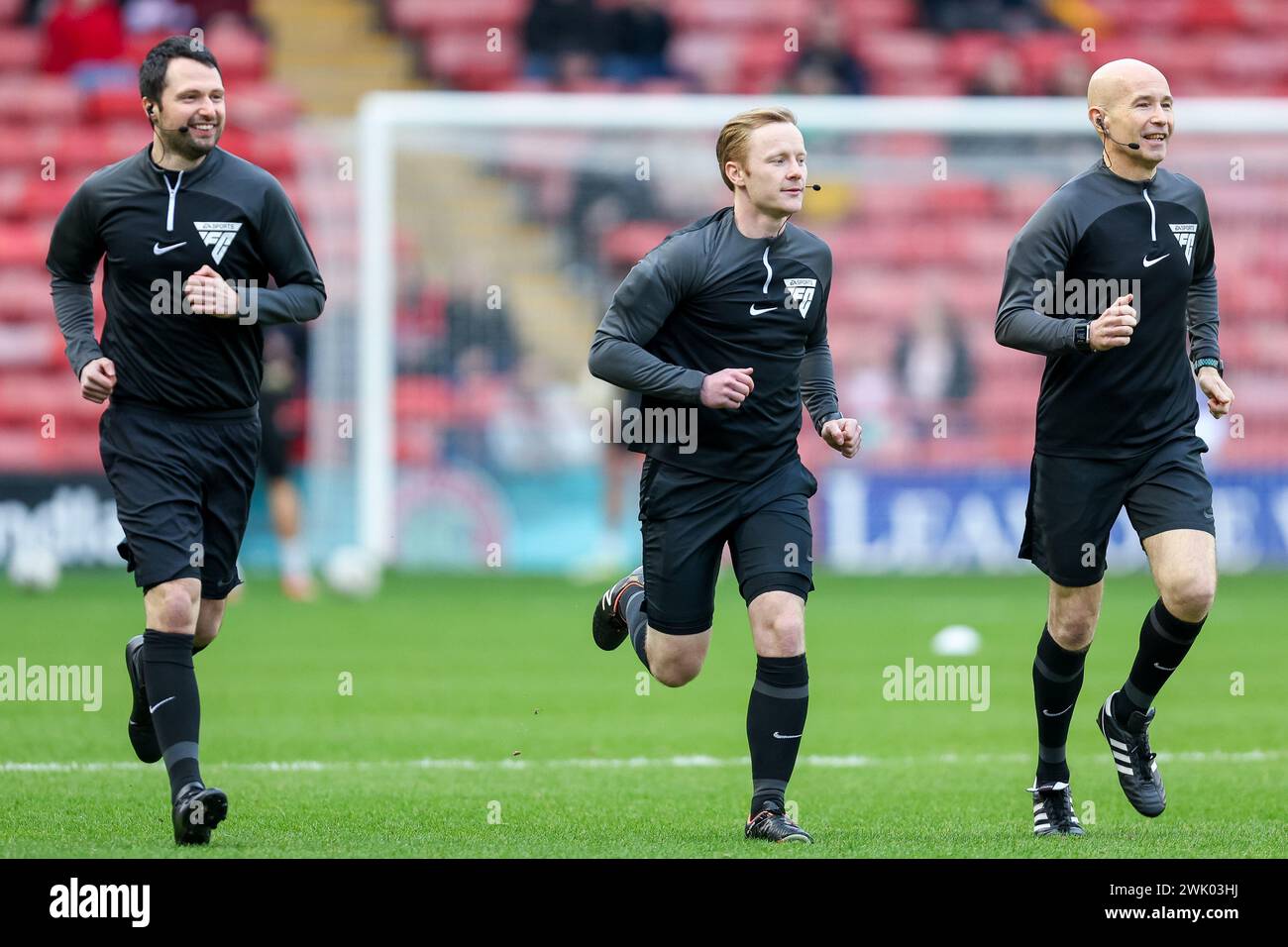 Walsall, UK. 17th Feb, 2024. Referee, Thomas Parsons warms up with Assistant referee, Alan Clayton & Assistant referee, Oliver Spender ahead of the EFL Sky Bet League 2 match between Walsall and Mansfield Town at the Poundland Bescot Stadium, Walsall, England on 17 February 2024. Photo by Stuart Leggett. Editorial use only, license required for commercial use. No use in betting, games or a single club/league/player publications. Credit: UK Sports Pics Ltd/Alamy Live News Stock Photo