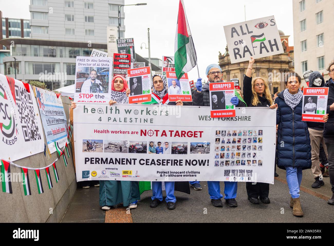 Leeds, UK. 17 FEB, 2024. Members of Health workers for palestine, including members wearing scrubs and gowns gather in city square as part of pro palestine demonstration. Credit Milo Chandler/Alamy Live News Stock Photo