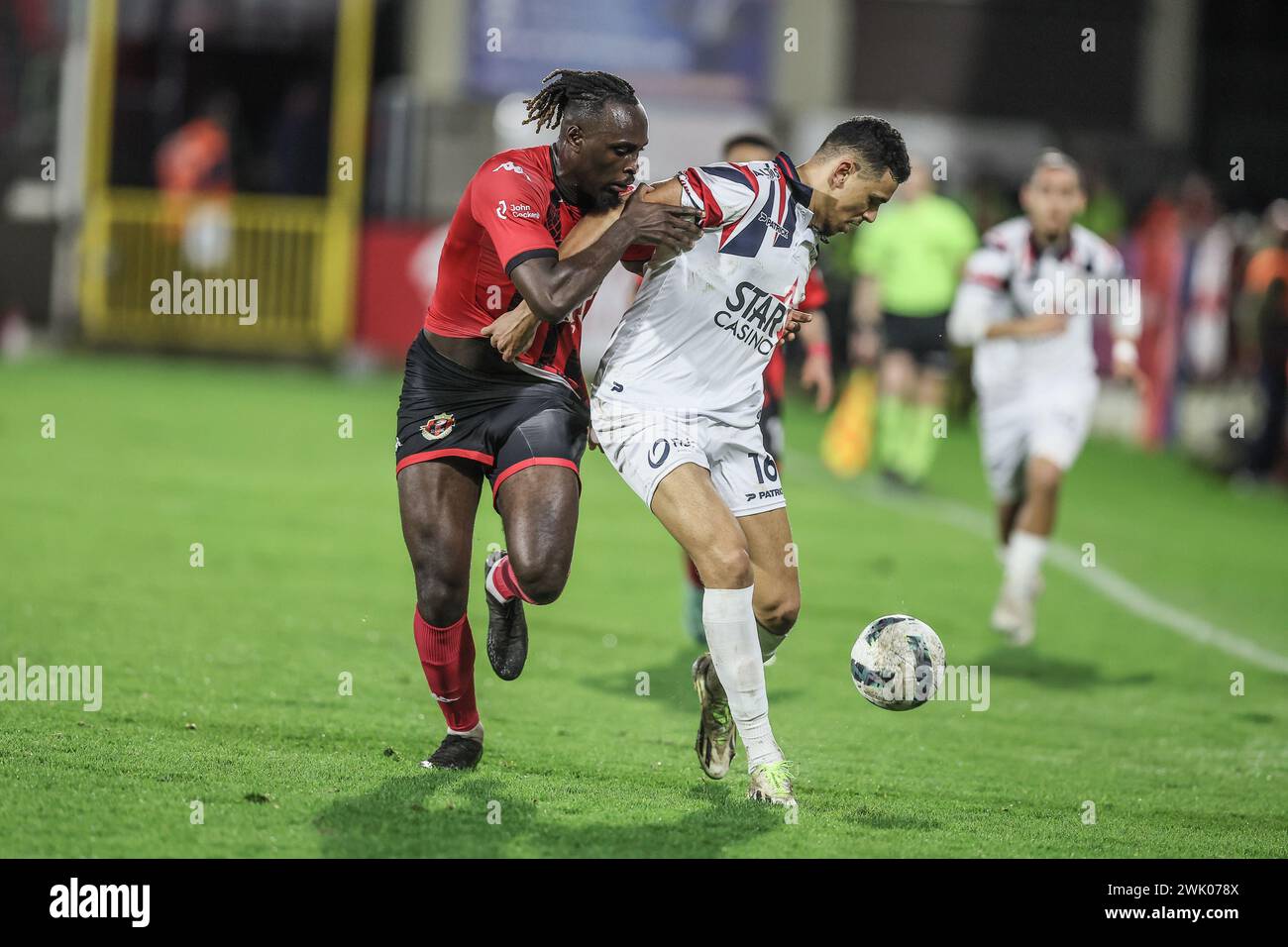 Seraing, Belgium. 17th Feb, 2024. Seraing's Marvin Silver Tshibuabua and Liege's Zakaria Atteri fight for the ball during a soccer match between RFC Seraing and RFC Liege, Saturday 17 February 2024 in Seraing, on day 22/30 of the 2023-2024 'Challenger Pro League' second division of the Belgian championship. BELGA PHOTO BRUNO FAHY Credit: Belga News Agency/Alamy Live News Stock Photo