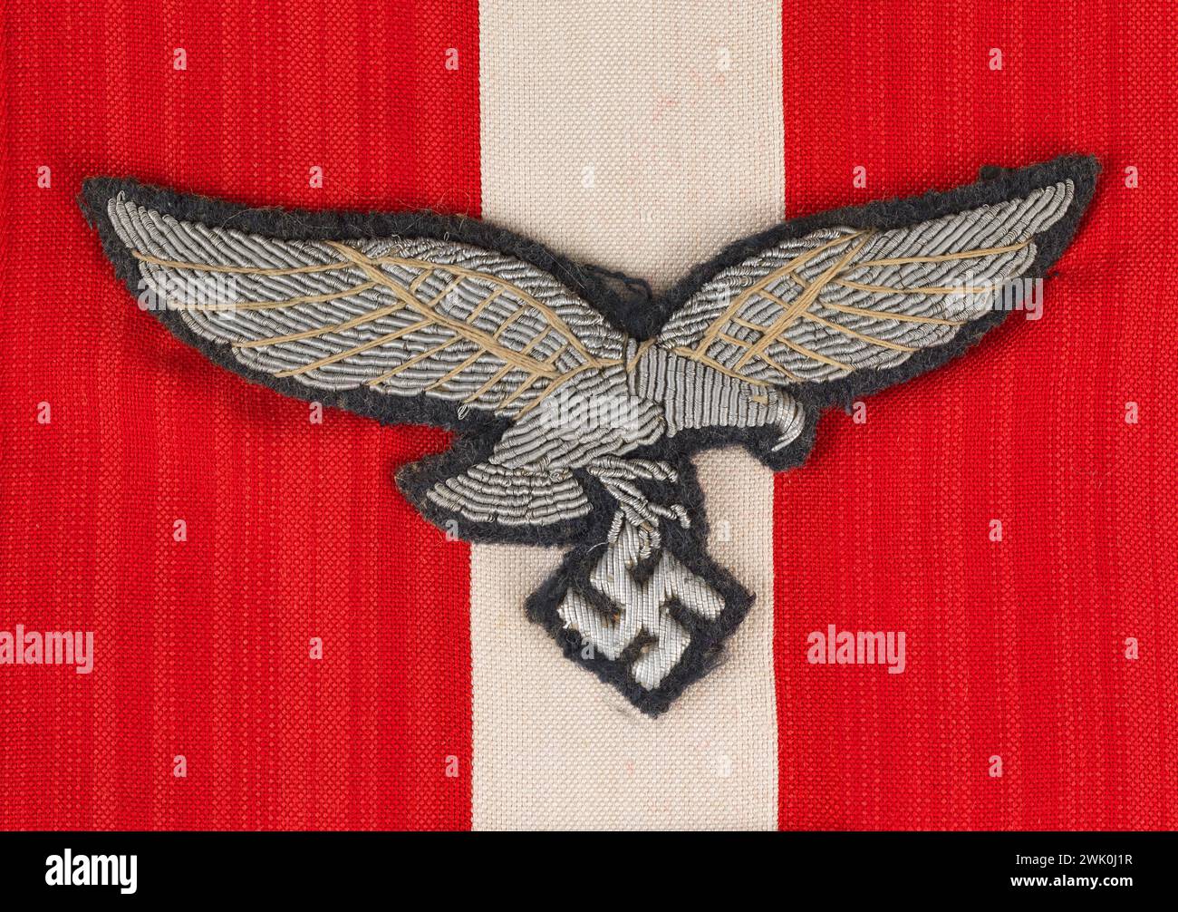 Chest eagle - 2nd model - of Luftwaffe officer (attributed title), 1935. Machine embroidered cannett with sheet. Paper. Museum of the Liberation of Paris - General Leclerc Museum - Jean Moulin Museum. Stock Photo