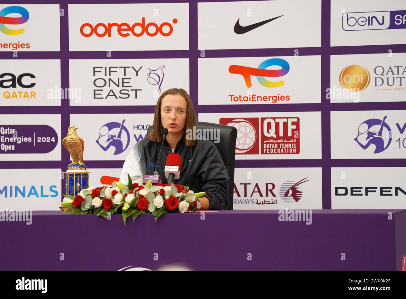Iga Swiatek speaking at a postmatch press conference after her final