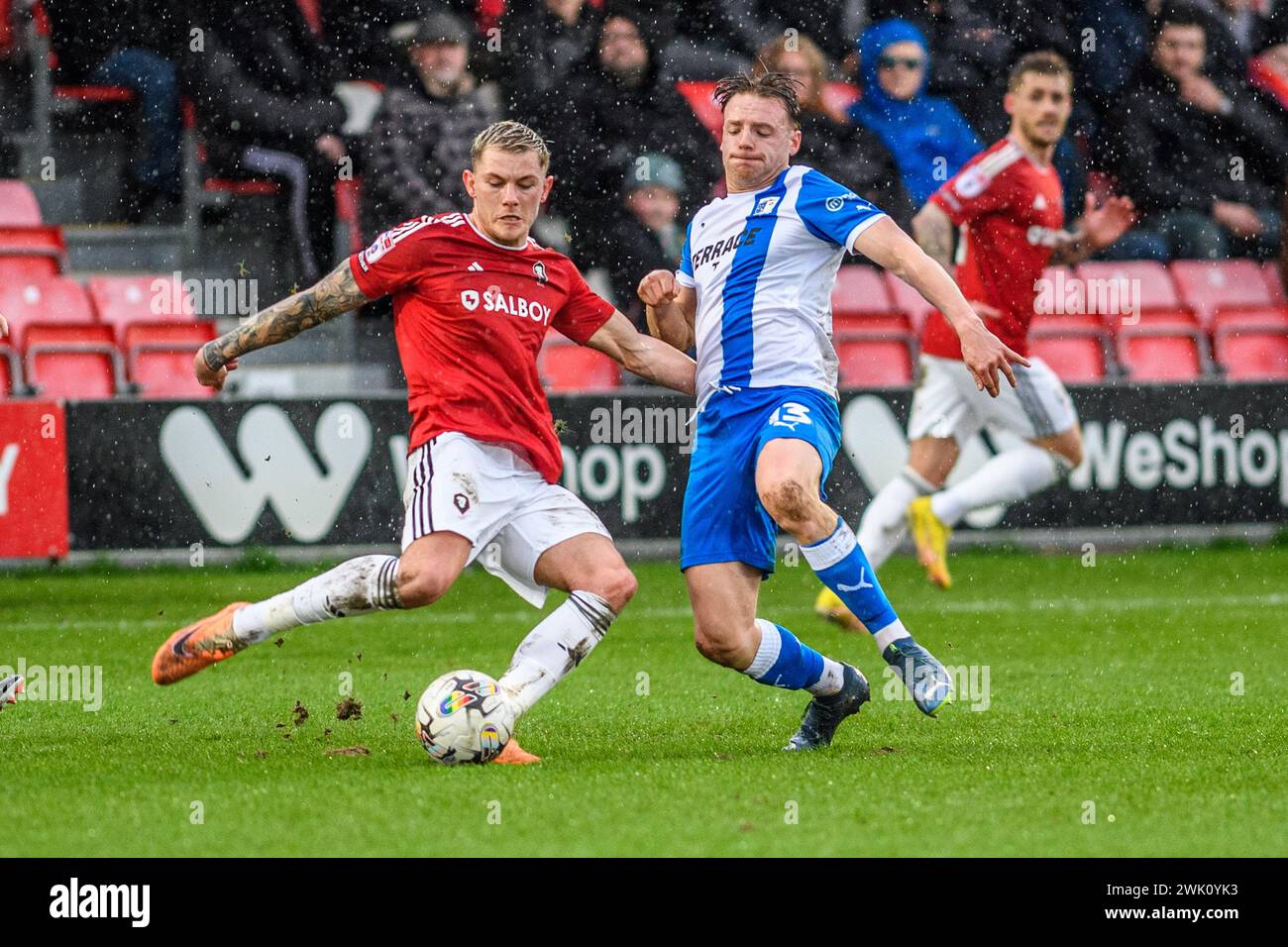 Barrow's Ben Whitfield tackles Salford City's Callum Hendry during the Sky Bet League 2 match between Salford City and Barrow at Moor Lane, Salford on Saturday 17th February 2024. (Photo: Ian Charles | MI News) Credit: MI News & Sport /Alamy Live News Stock Photo