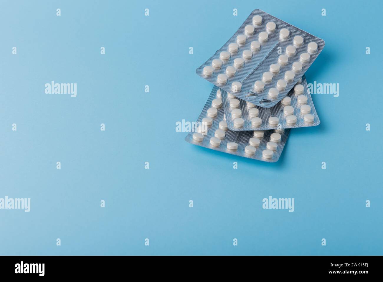 Three Tablets Close up of a pack of blisters. bicolor pills in the blister. Three ...