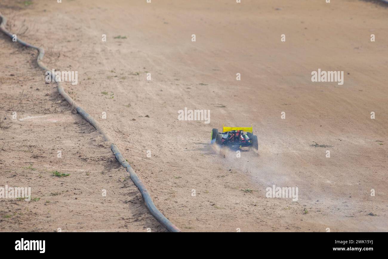 Merida, Spain - Jan 28th, 2024: Extremadura 1/8tt gas Championship RC Car. Car accelerating on a straight Stock Photo