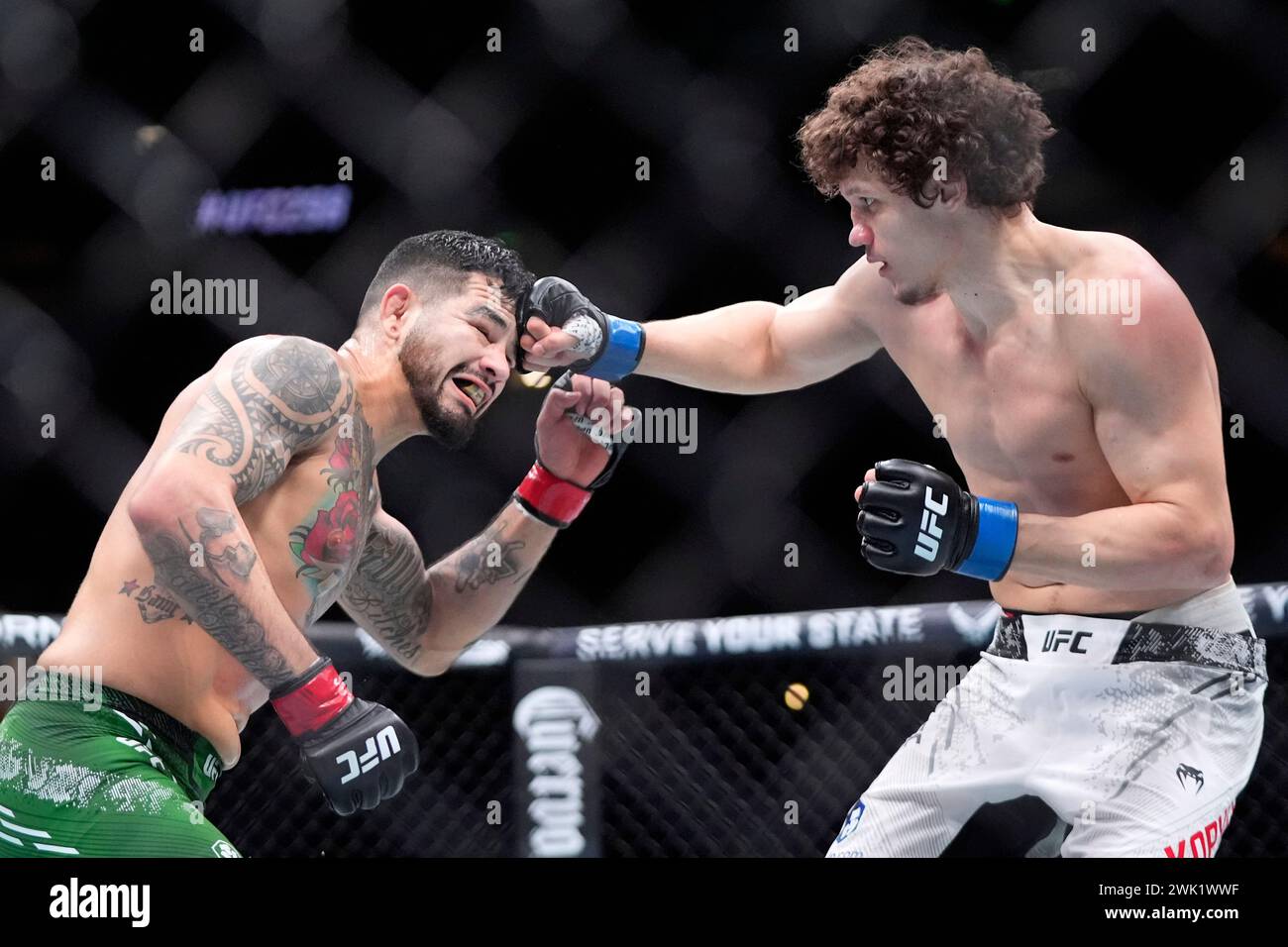 Roman Kopylov, right, connects with Anthony Hernandez during their