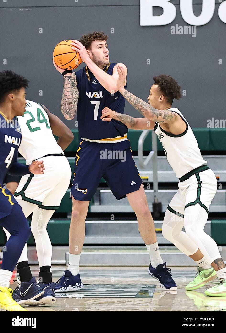 February 17, 2024: Northern Arizona Lumberjacks forward Carson Basham (7) pulls down a defensive rebound during the NCAA basketball game between the Northern Arizona Lumberjacks and the Portland State Vikings at the Stott Center, Portland, OR. Larry C. Lawson/CSM Stock Photo