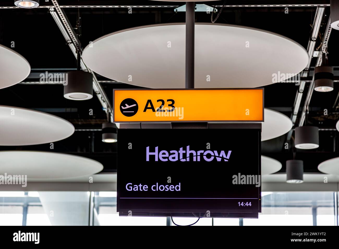 An informational sign at Gate A23 hanging from the ceiling in Terminal ...