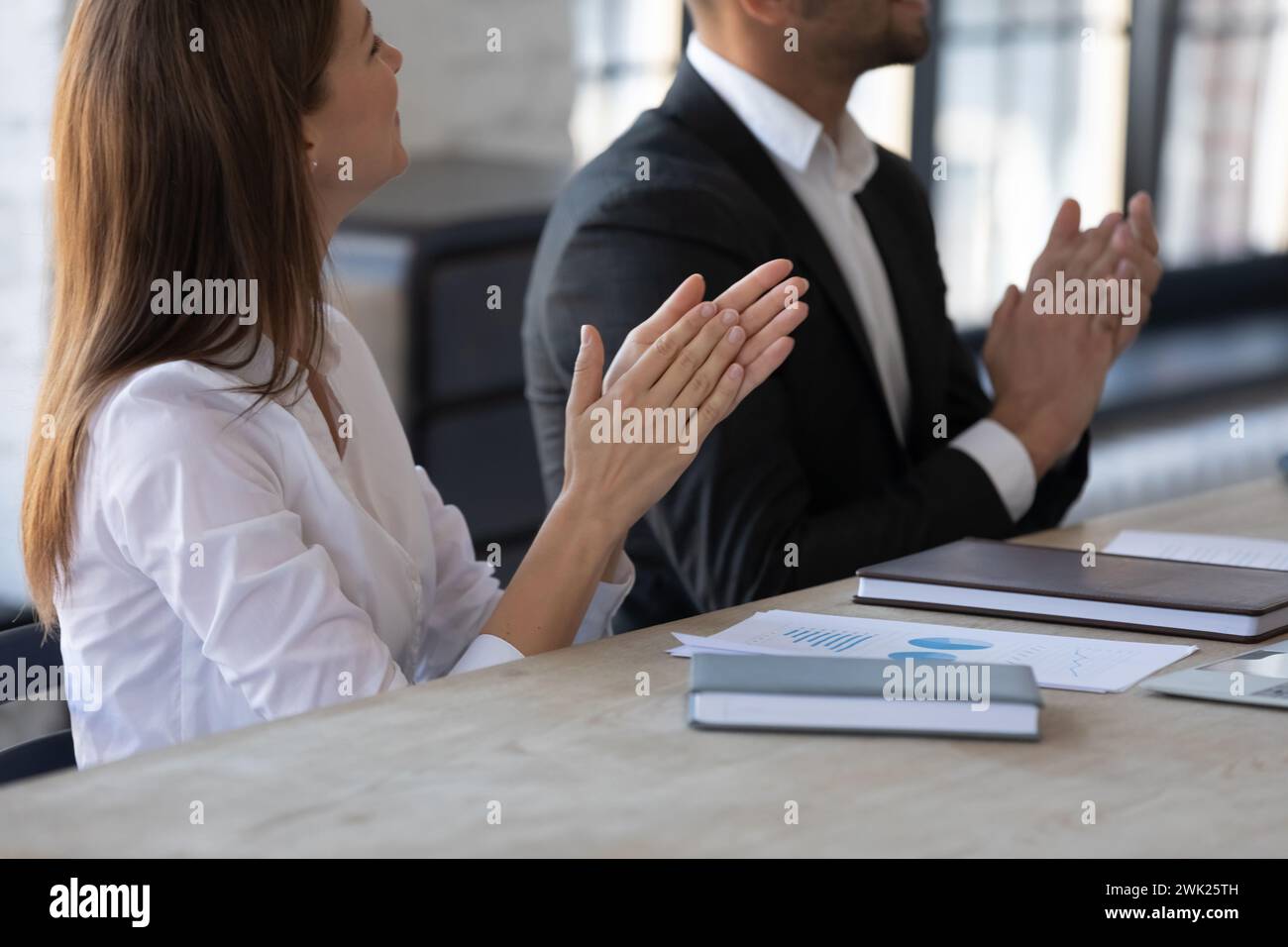 Positive man woman workers clap hi-res stock photography and images - Alamy