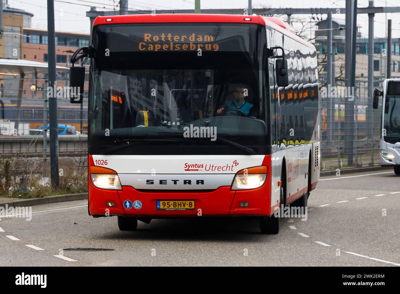 Red White regional buses of bus company Keolis at Utrecht station in the Netherlands Stock Photo