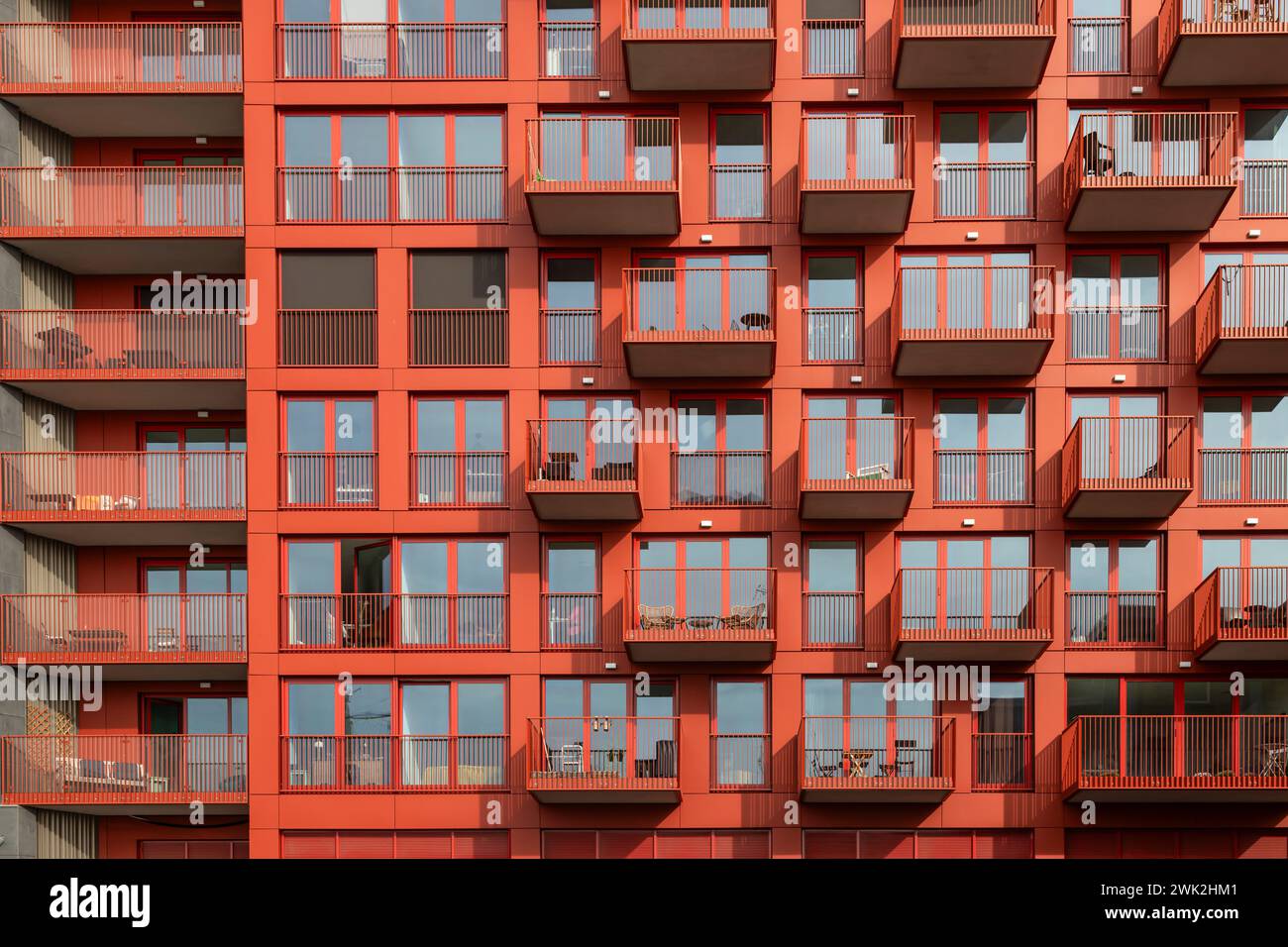Modern red colored apartments in the new NDSM district in Amsterdam. Stock Photo
